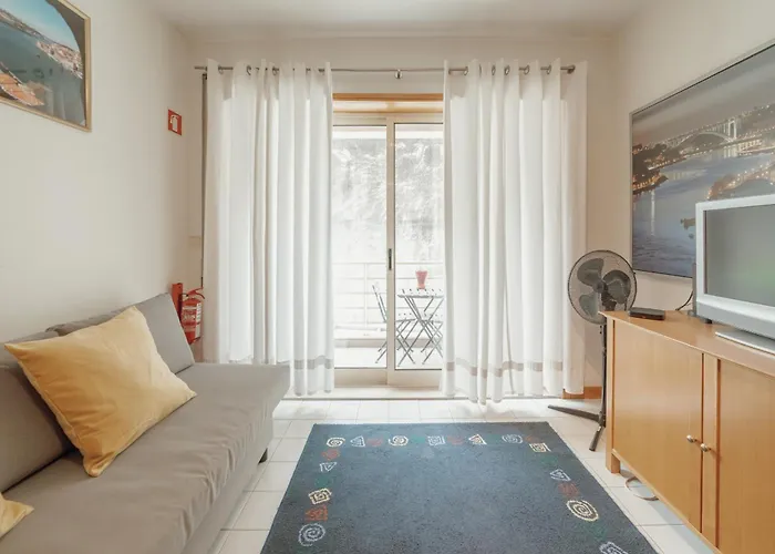 Downtown Trindade Apartment With Terrace By Vacationy